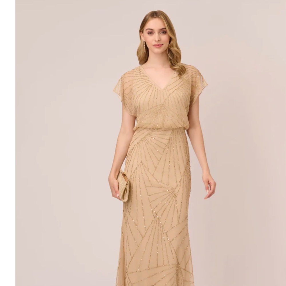 Size 14. Fits more like a 12. Blush pink, with gold beads